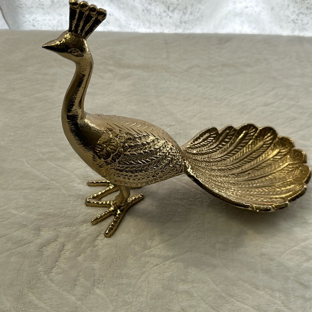 beautiful gold colored peacock